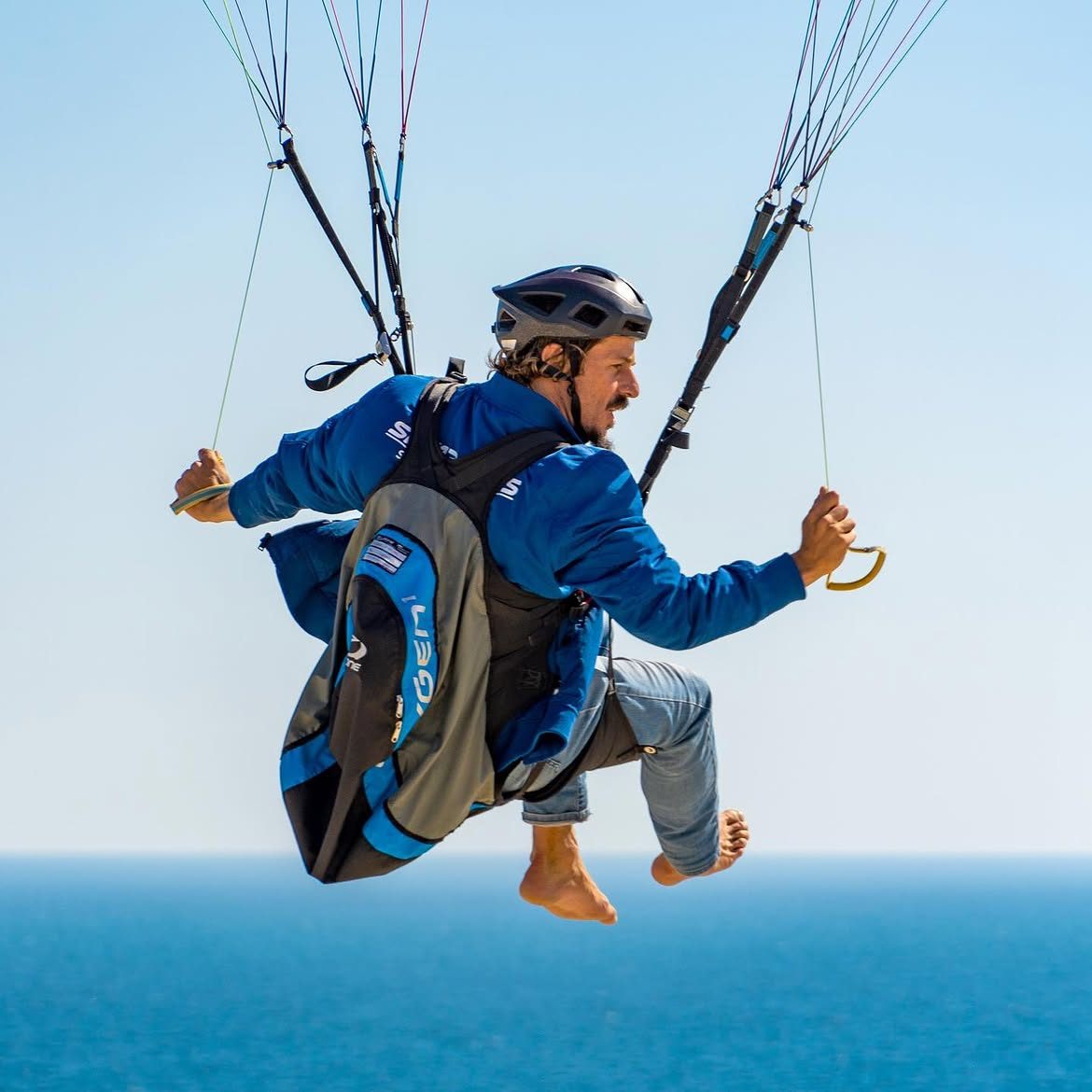 Javi flying barefoot over the sea